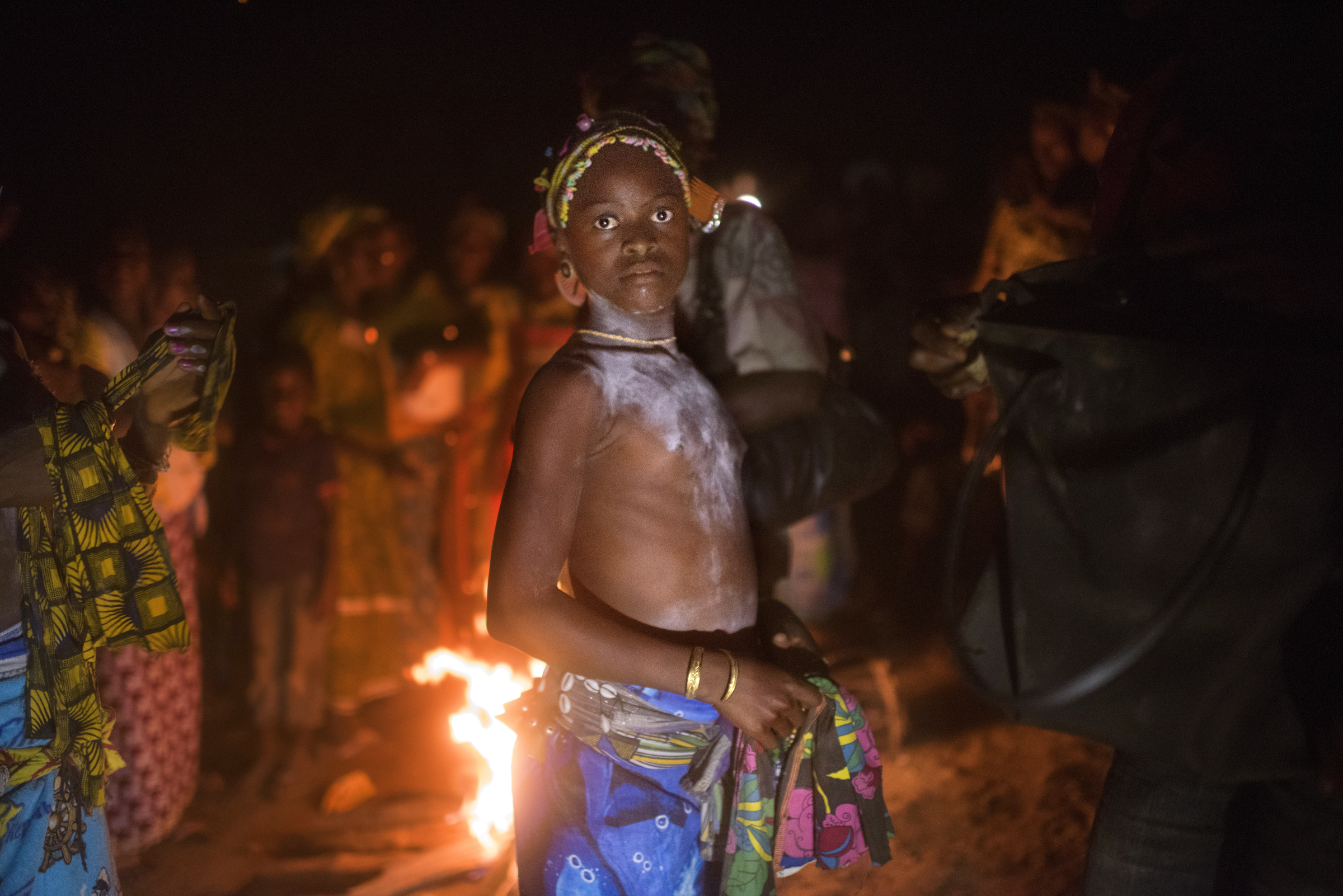 At a Bondo ceremony in Kabala that includes FGM/C, girls prepare to be initiated into the secret society for females as they pass from adolescence to womanhood.