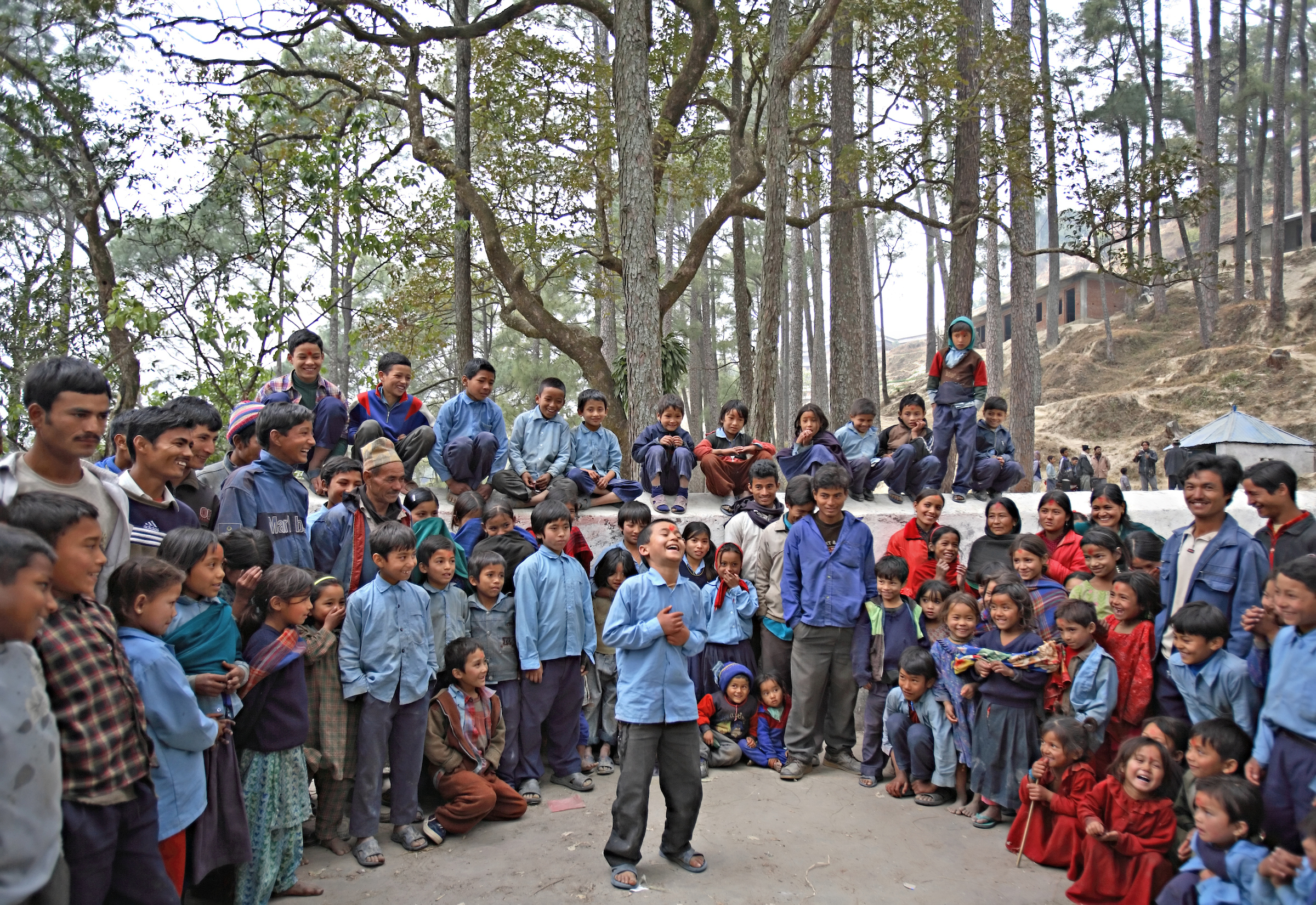 Capitalizing on the crowds, Shanta, 14, performs a skit against child marriage in the minutes following two child marriage ceremonies in Kagati village, Nepal.